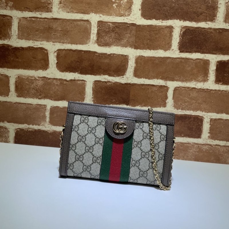 G*u*i clutch bags